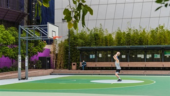 A basketball court was preserved during the transformation to offer venues for active activities.